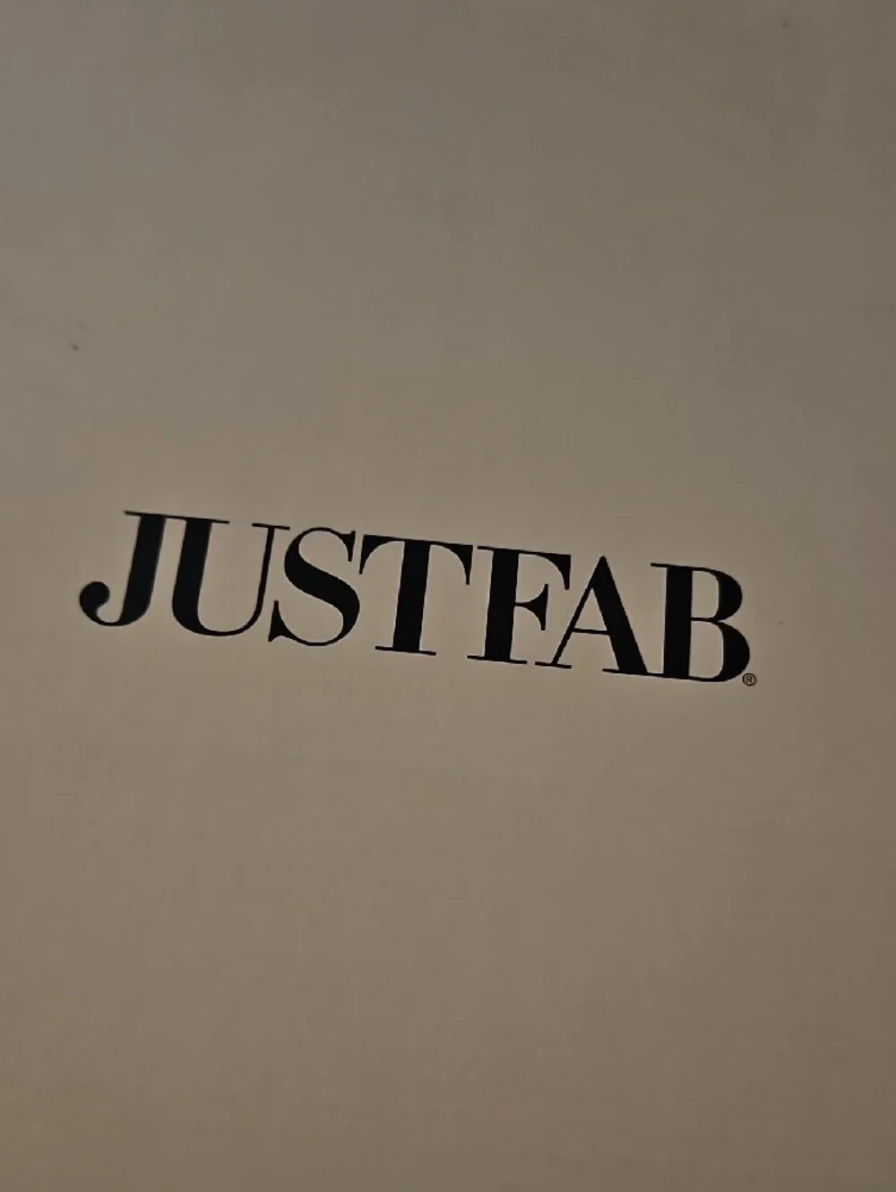 JustFab Logo Print on Cream Background